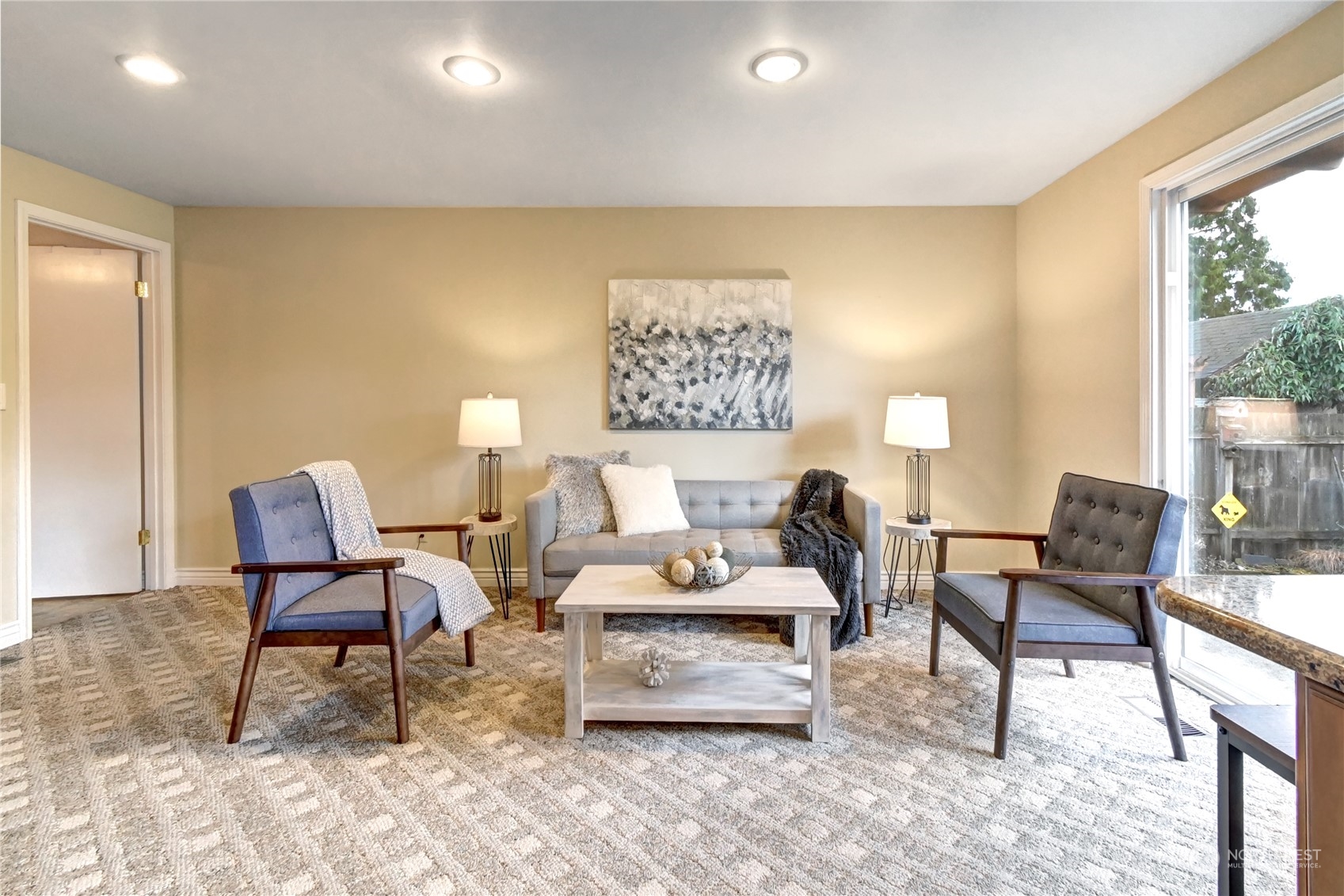 10 217th Place Southwest Bothell, WA 98021 - Photo 13 of 31 a living room with furniture and a large window
