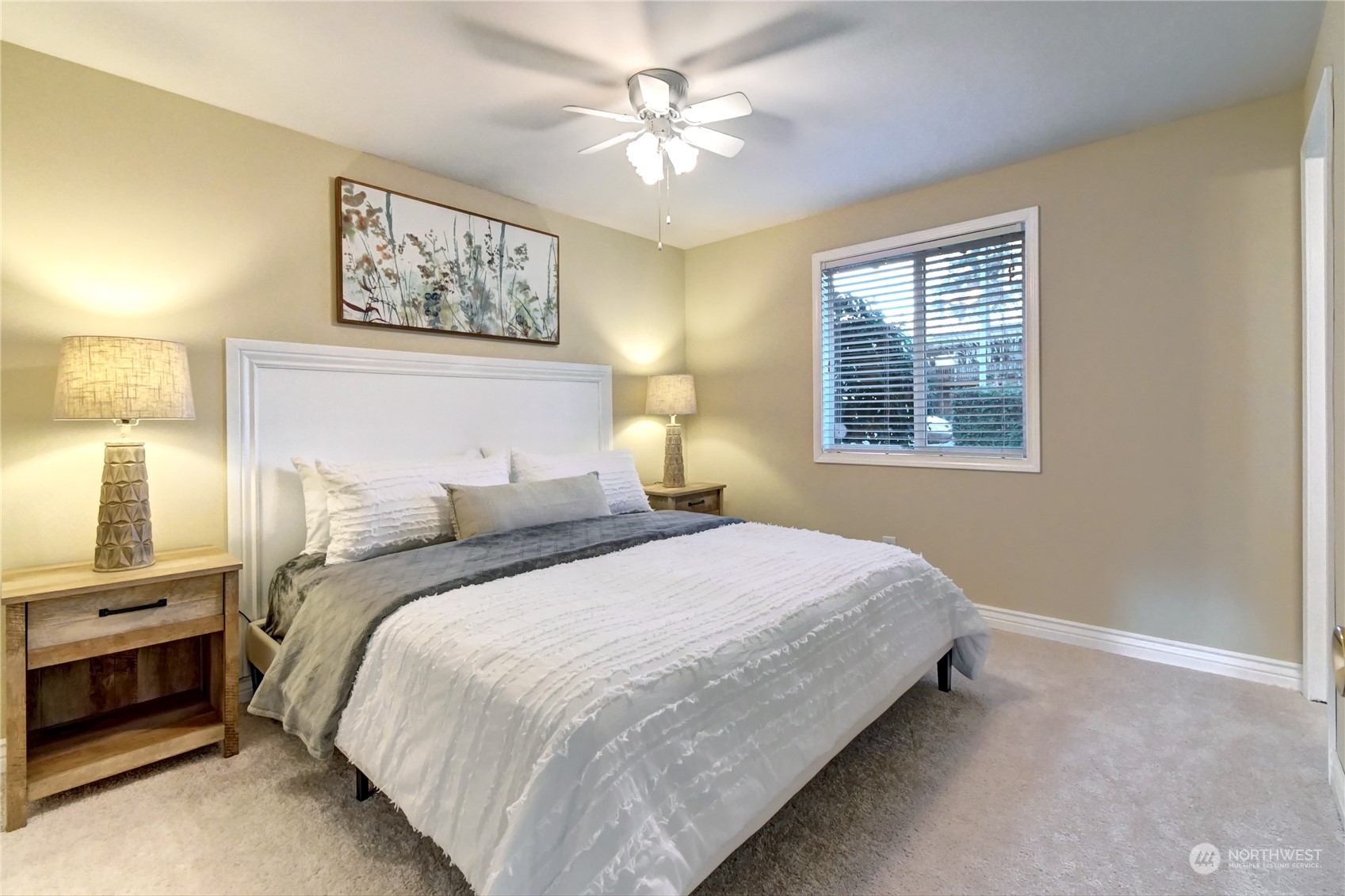 10 217th Place Southwest Bothell, WA 98021 - Photo 14 of 31 a bedroom with bed and a chandelier