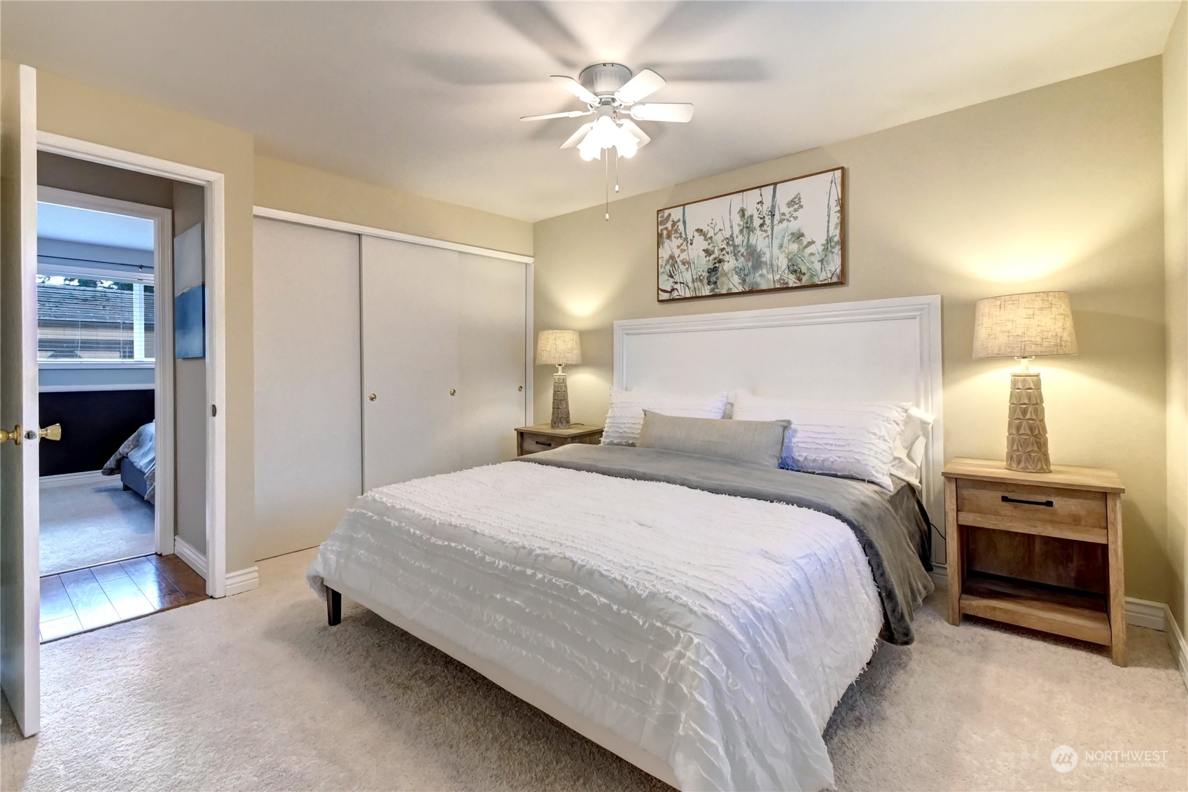 10 217th Place Southwest Bothell, WA 98021 - Photo 15 of 31 a bedroom with a bed and a walk in closet