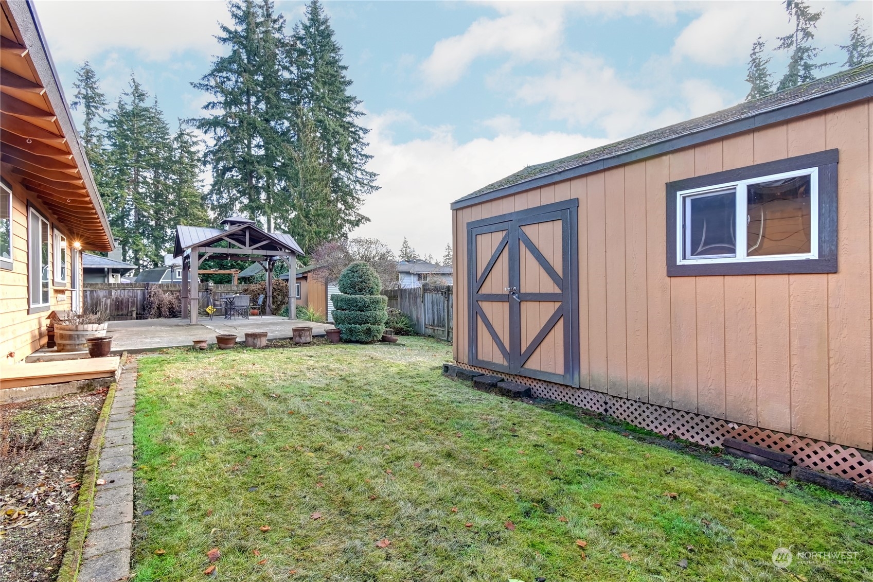 10 217th Place Southwest Bothell, WA 98021 - Photo 27 of 31 a front view of a house with garden