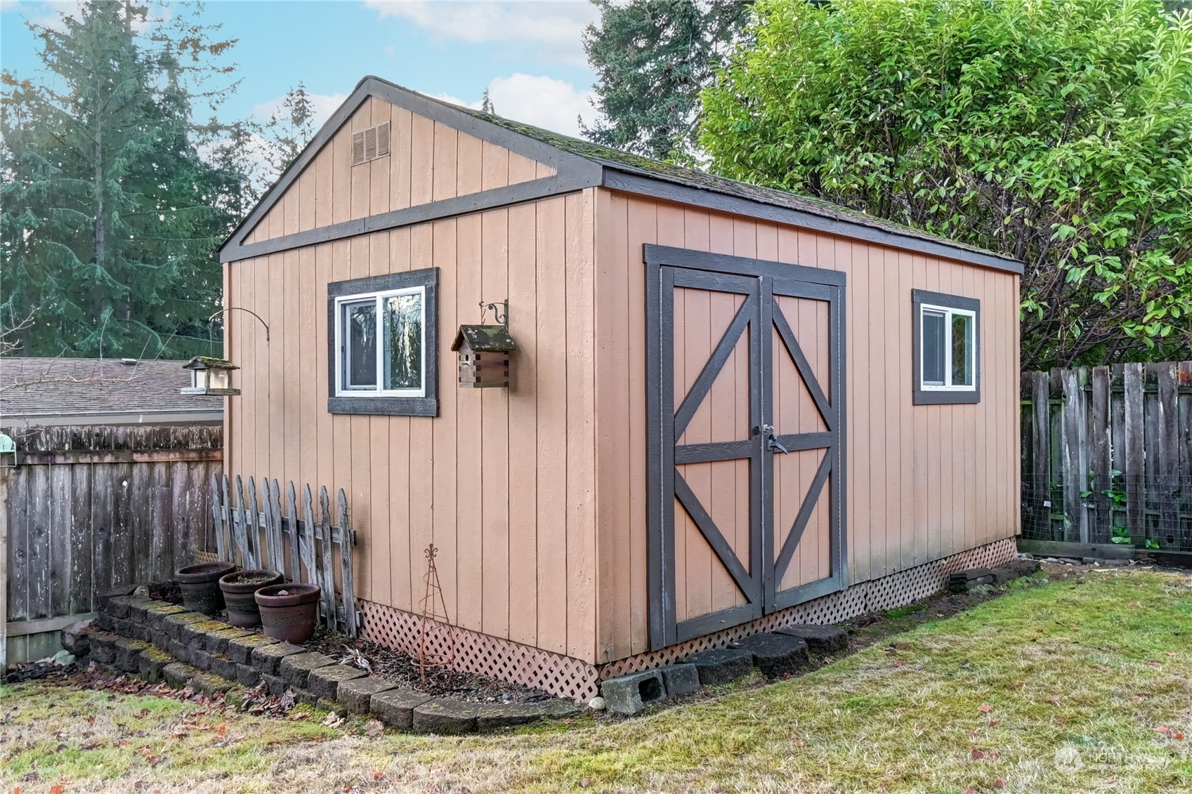 10 217th Place Southwest Bothell, WA 98021 - Photo 28 of 31 a view of backyard of house with wooden fence