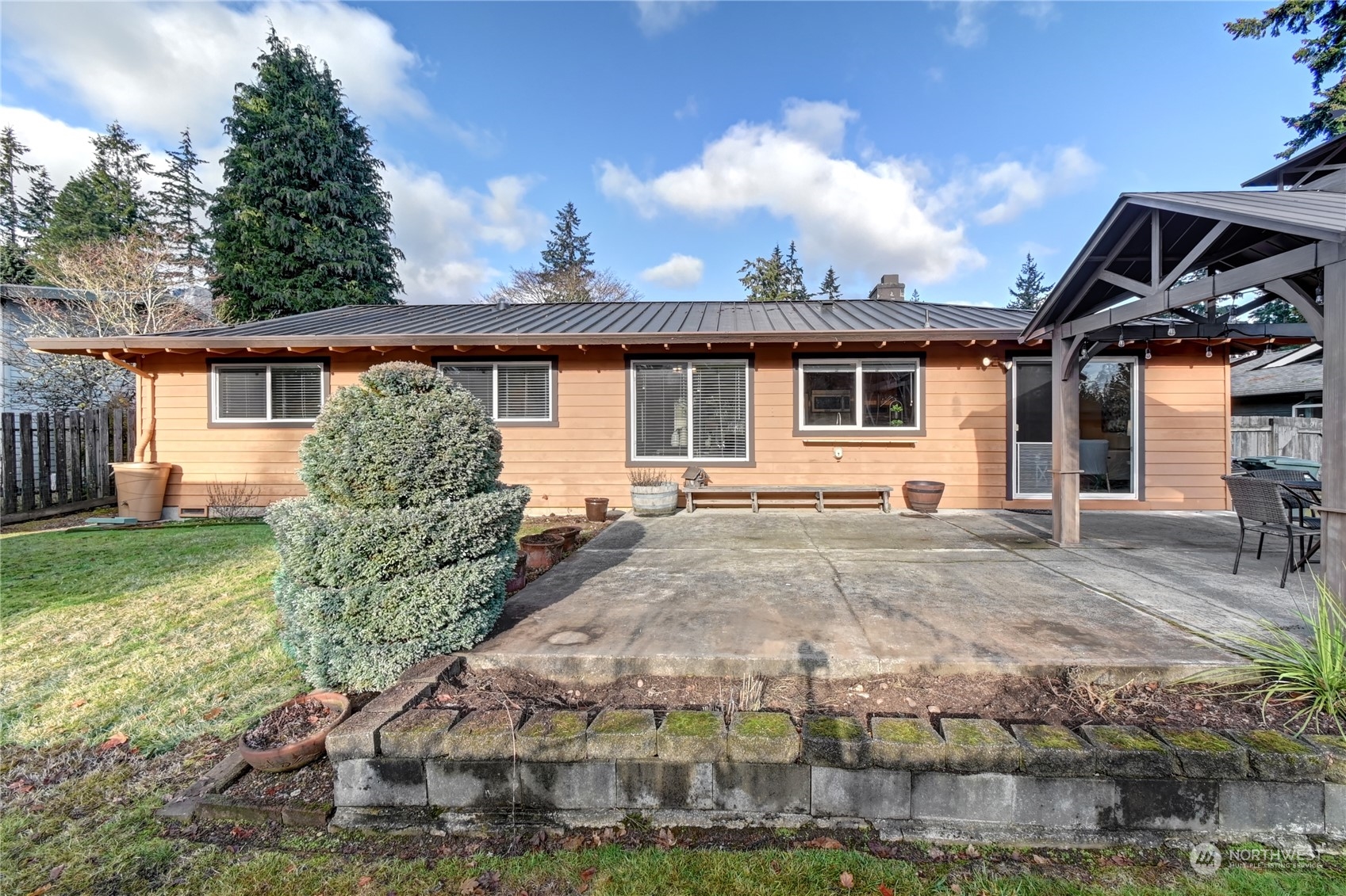 10 217th Place Southwest Bothell, WA 98021 - Photo 30 of 31 a view of a house with backyard and garden