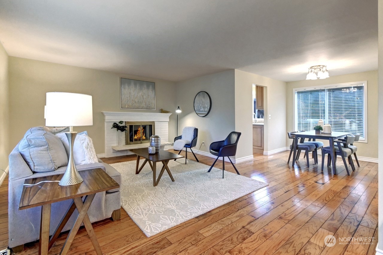 10 217th Place Southwest Bothell, WA 98021 - Photo 5 of 31 a living room with furniture and wooden floor