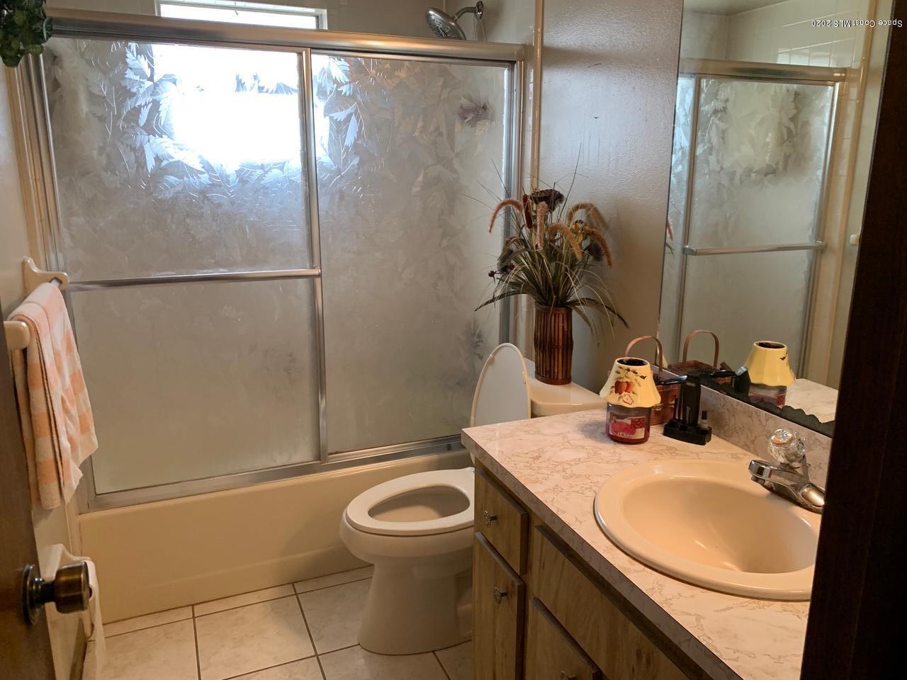 1640 West Shores Road Melbourne, FL 32935 - Photo 6 of 10 Butchie Bathroom 1