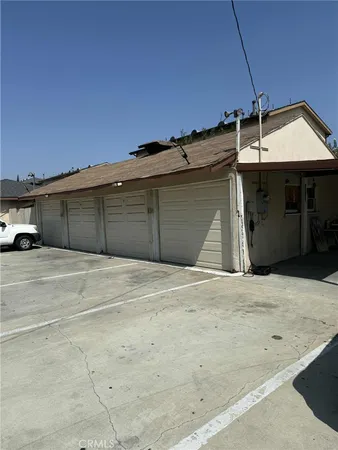 a front view of a house with a garage