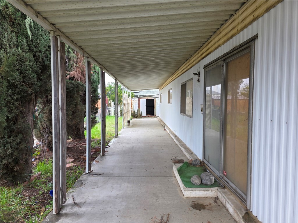 324 Long Street Hemet, CA 92543 - Photo 2 of 5 a view of a house with backyard and garden