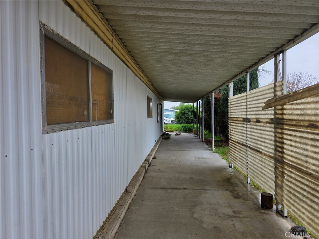 324 Long Street Hemet, CA 92543 - Photo 3 of 5 a view of a pathway with a house