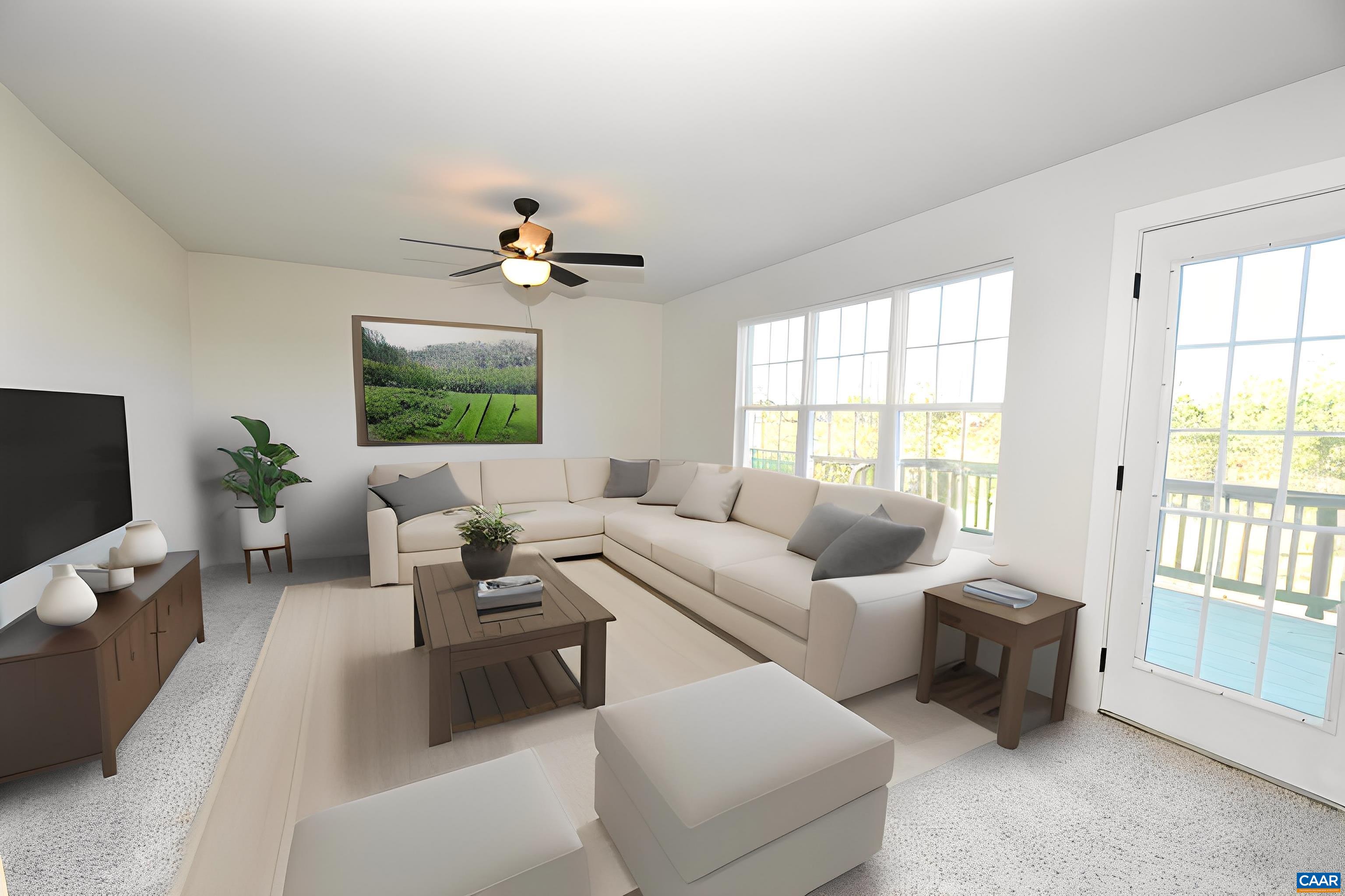71 Riva Way Palmyra, VA 22963 - Photo 11 of 26 a living room with furniture and a flat screen tv