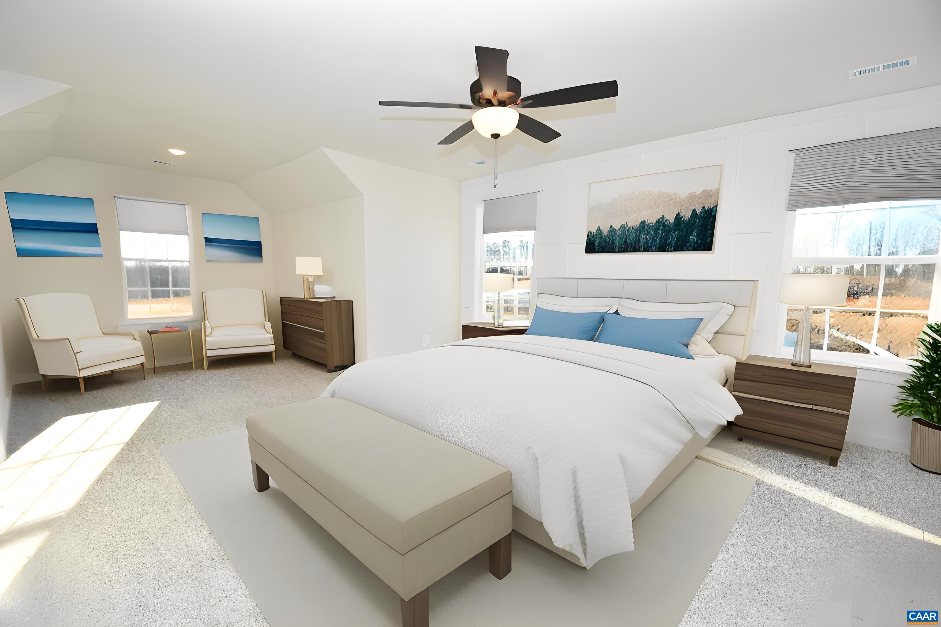 71 Riva Way Palmyra, VA 22963 - Photo 14 of 26 a spacious bedroom with a bed a couch and a window