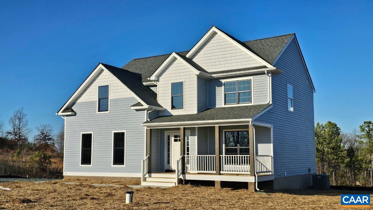 71 Riva Way Palmyra, VA 22963 - Photo 2 of 26 a front view of a house with a yard