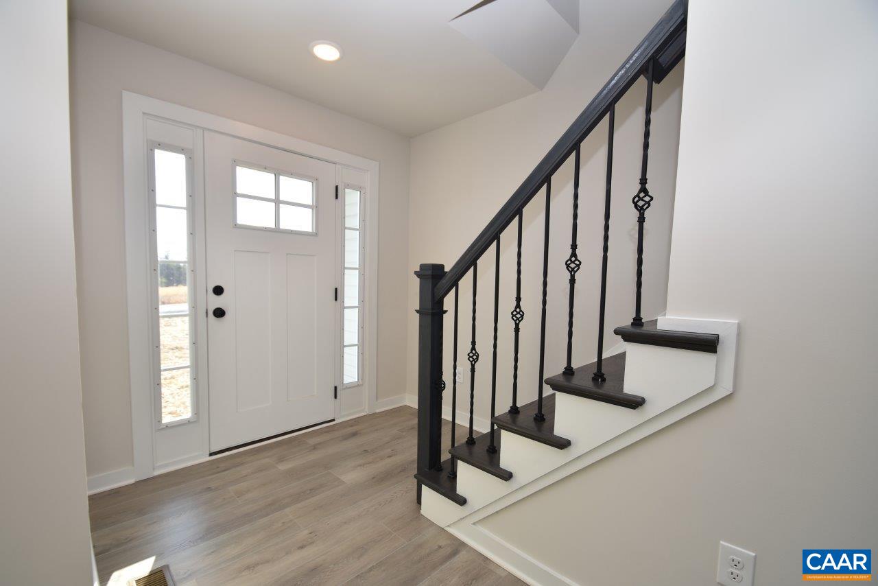 71 Riva Way Palmyra, VA 22963 - Photo 4 of 26 a view of entryway with wooden floor and stairs