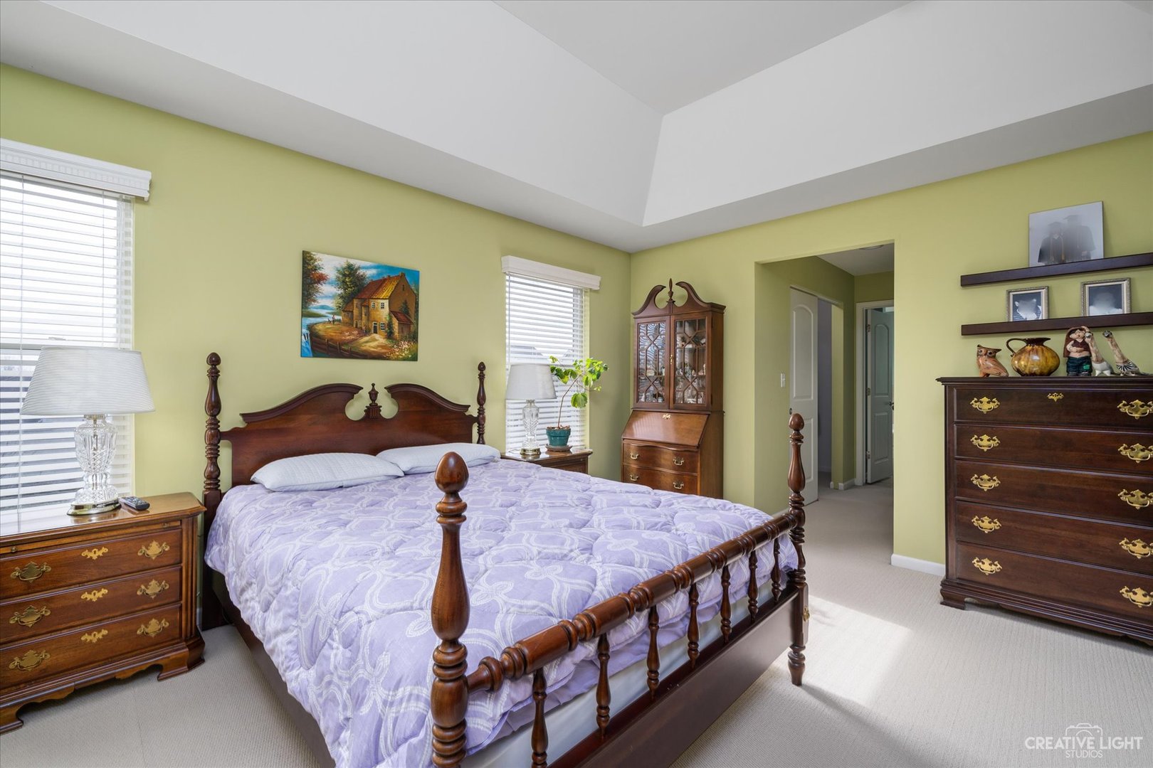 3521 English Prairie Road Elgin, IL 60124 - Photo 18 of 35 a bedroom with a bed a dresser and painting on the wall
