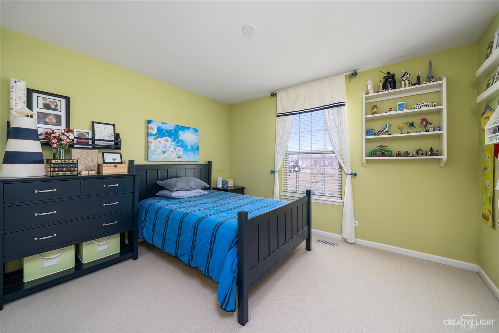 3521 English Prairie Road Elgin, IL 60124 - Photo 24 of 35 a bedroom with a bed and paintings on the wall