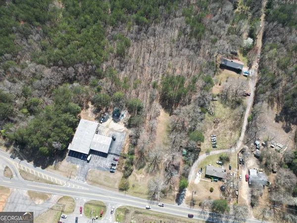 an aerial view of residential house with outdoor space