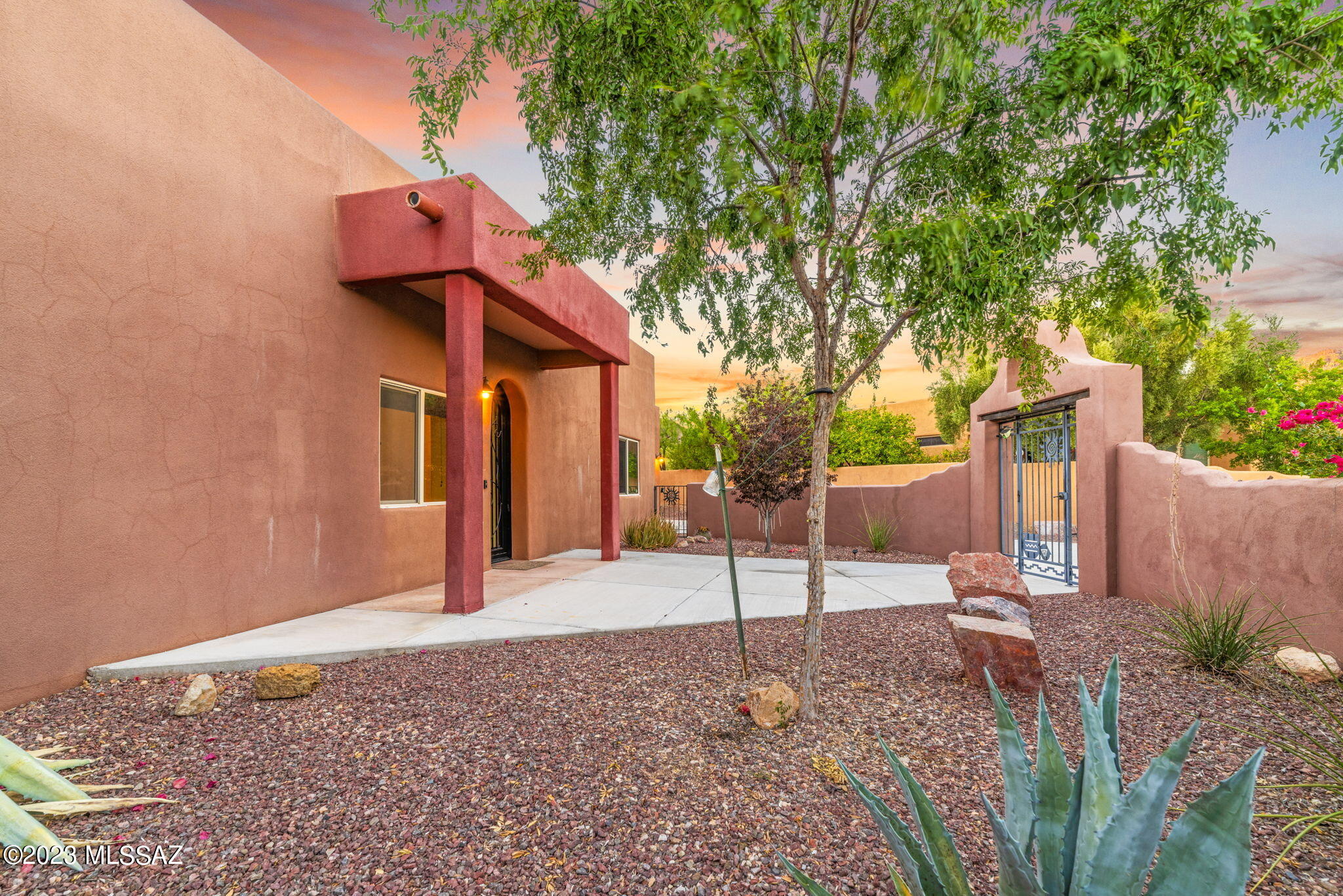 5670 Triangle X Place Tucson, AZ 85713 - Photo 5 of 36 a house view with a backyard space