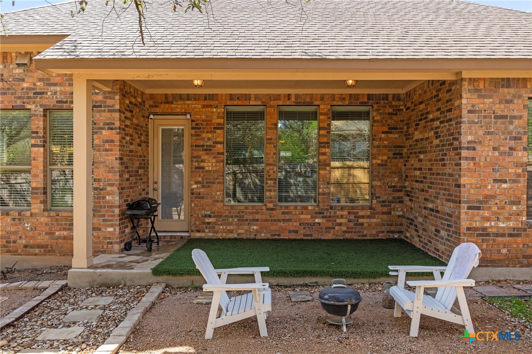 1205 Winding Way Drive Georgetown, TX 78628 - Photo 38 of 39 View of yard looking at patio