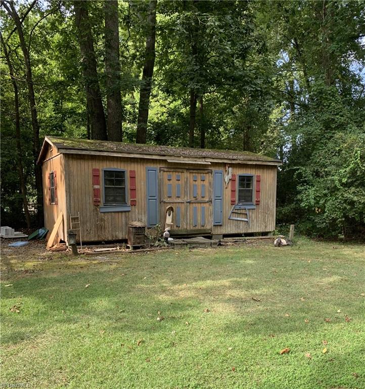 3208 Groometown Road Greensboro, NC 27407 - Photo 5 of 9 One of 2 outdoor sheds on the property.