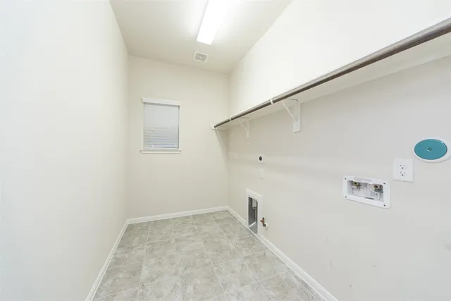 a view of a refrigerator in a bathroom