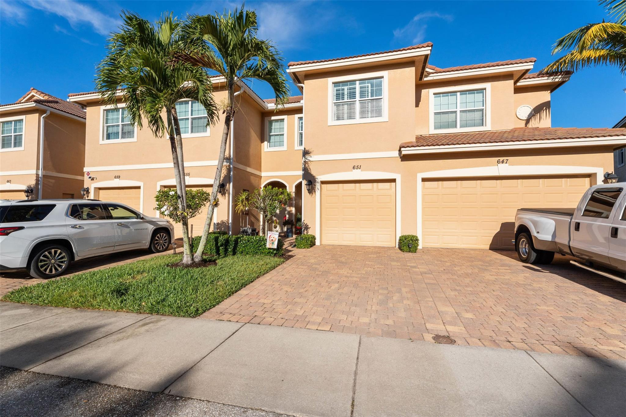 651 Southwest Glen Crest Way, Unit 2 Stuart, FL 34997 - Photo 28 of 41 a view of a house with a patio
