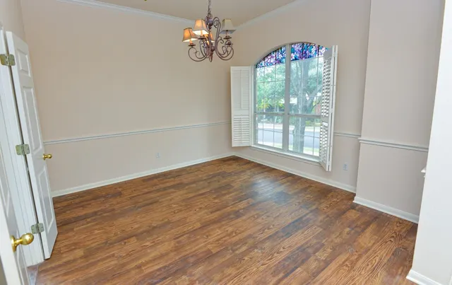 a kitchen with a stove sink and a microwave