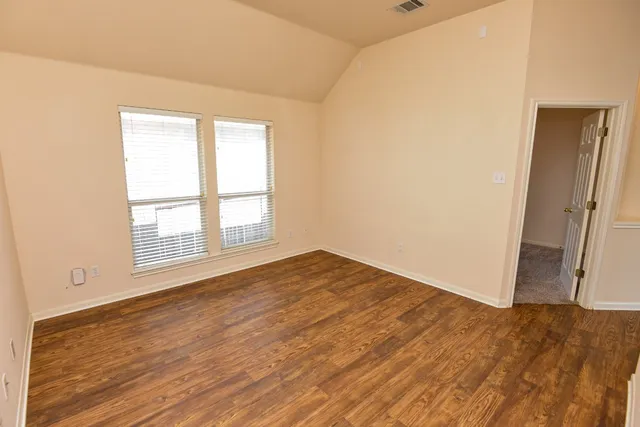 a kitchen with a sink a counter top space and appliances