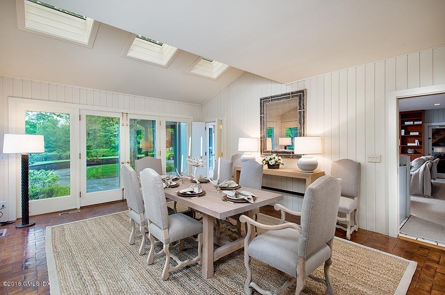 3 Old Mill Road Greenwich, CT 06830 - Photo 6 of 20 a dining room with furniture window and wooden floor