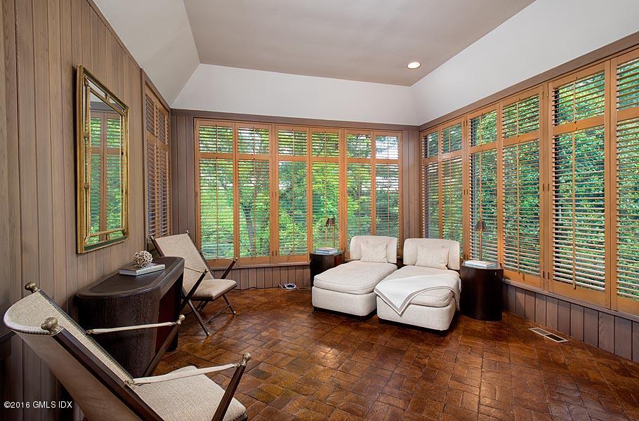 3 Old Mill Road Greenwich, CT 06830 - Photo 8 of 20 a living room with furniture and large windows