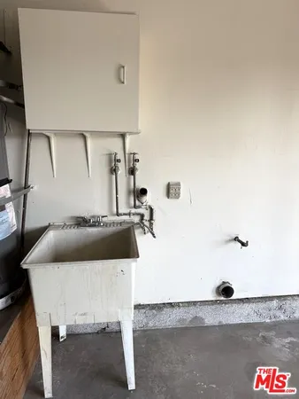 a view of swimming pool with furniture