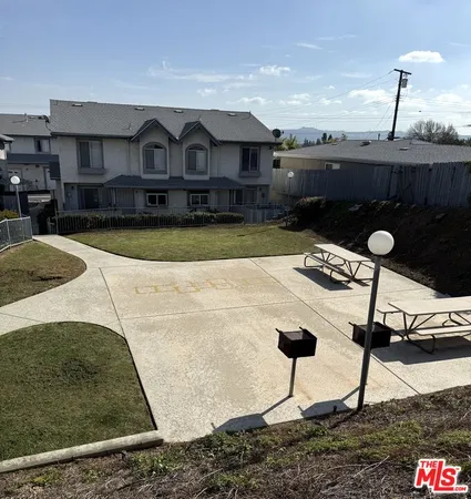a front view of a house with swimming pool