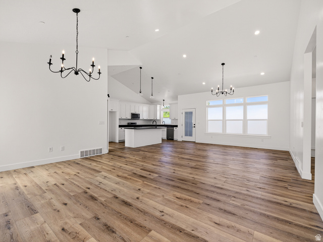 1257 North 1350th Street East Mapleton, UT 84664 - Photo 8 of 45 Luxury Vinyl Hardwood Flooring Throughout main level.