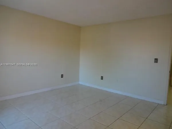 a view of bathroom with mirror and sink