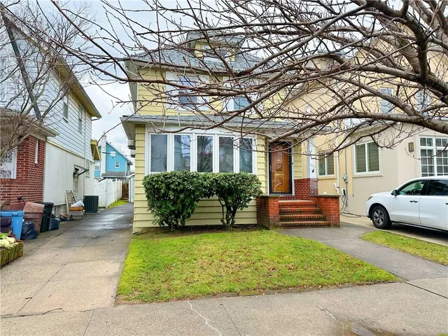 a house view with a garden space