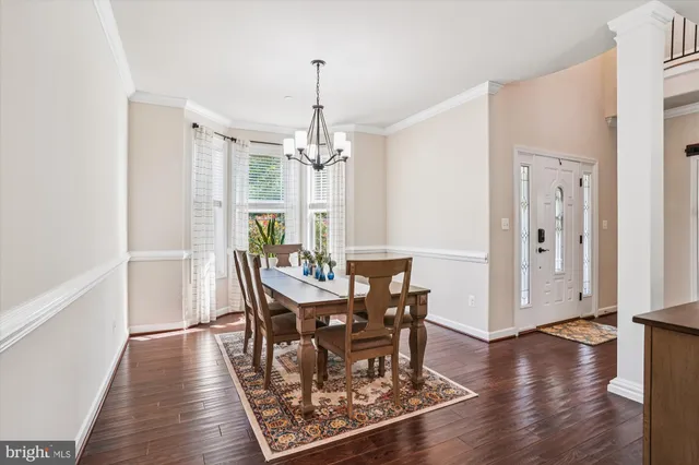 a room with furniture and wooden floor