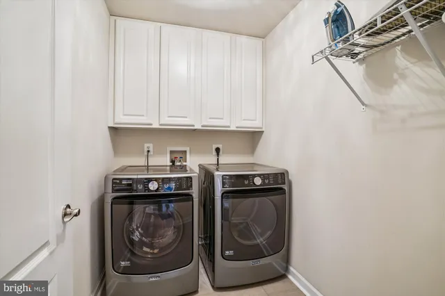 a bed room with a bed and a window