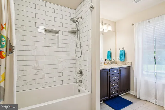 a view of a hallway view with wooden floor and staircase