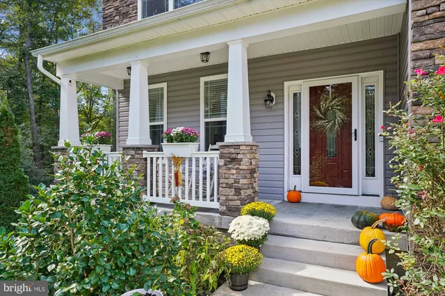 a view of a two chairs in the balcony
