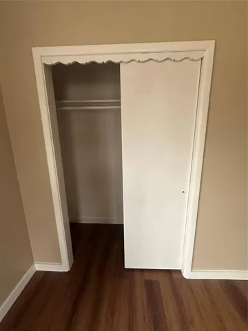 a bathroom with a sink a toilet and vanity