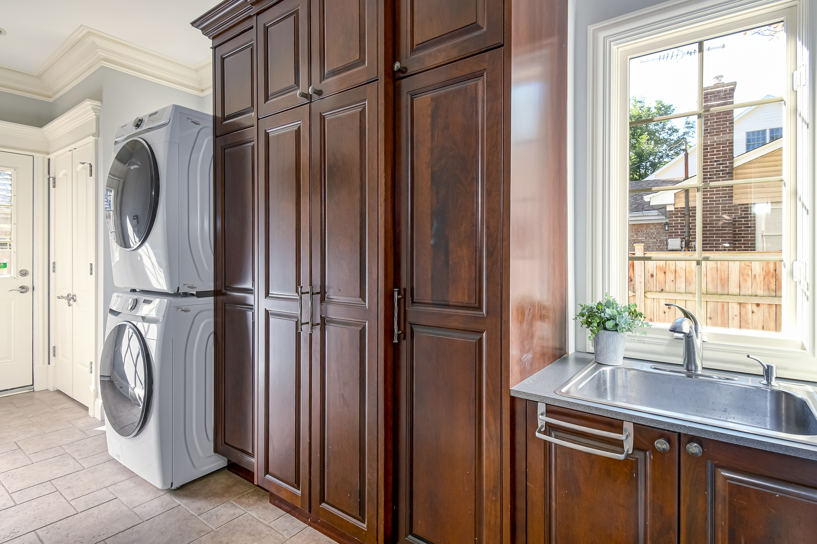 621 North County Line Road Hinsdale, IL 60521 - Photo 15 of 48 a kitchen with a refrigerator and a sink