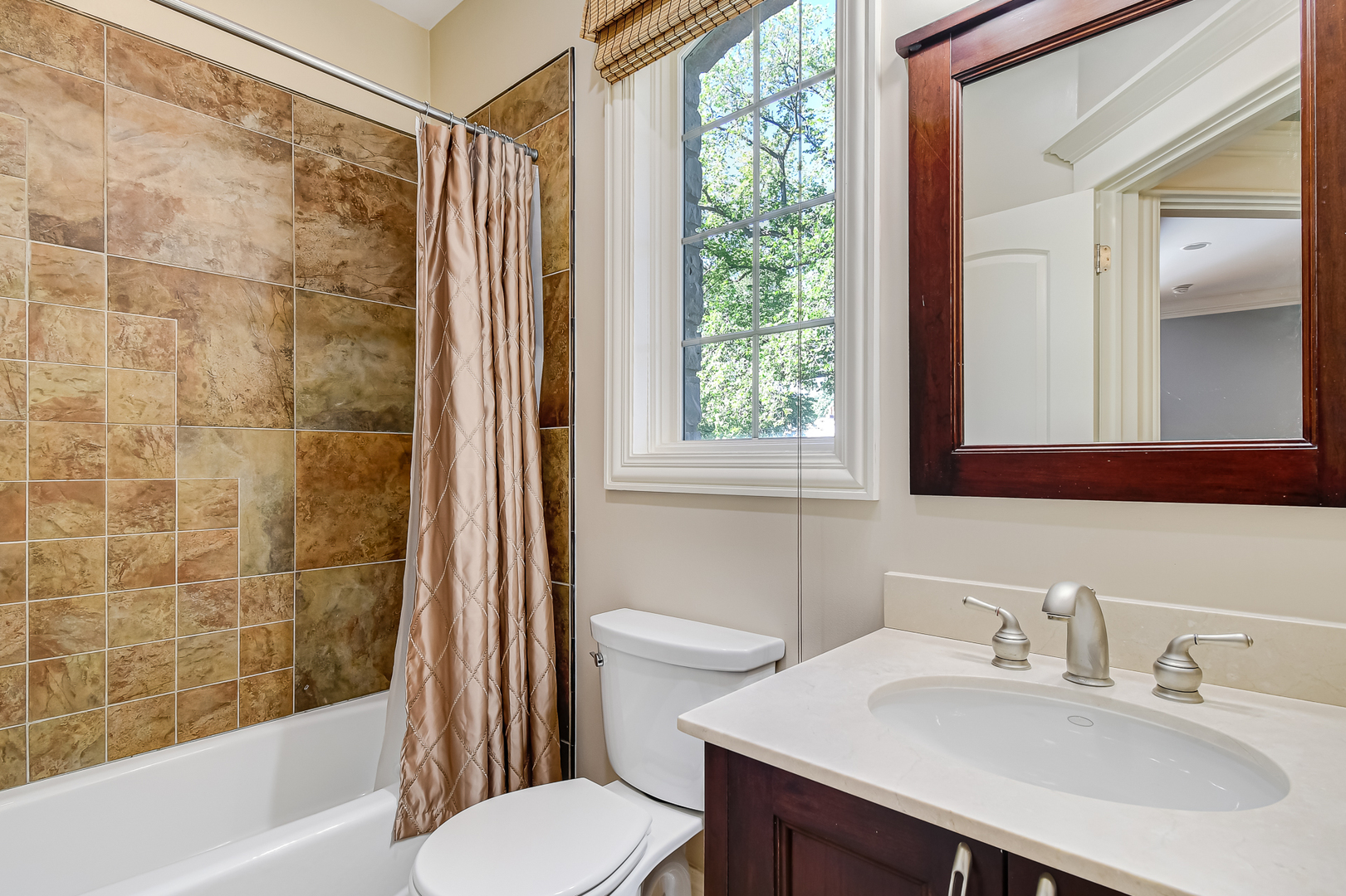 621 North County Line Road Hinsdale, IL 60521 - Photo 23 of 48 a bathroom with a sink and a mirror