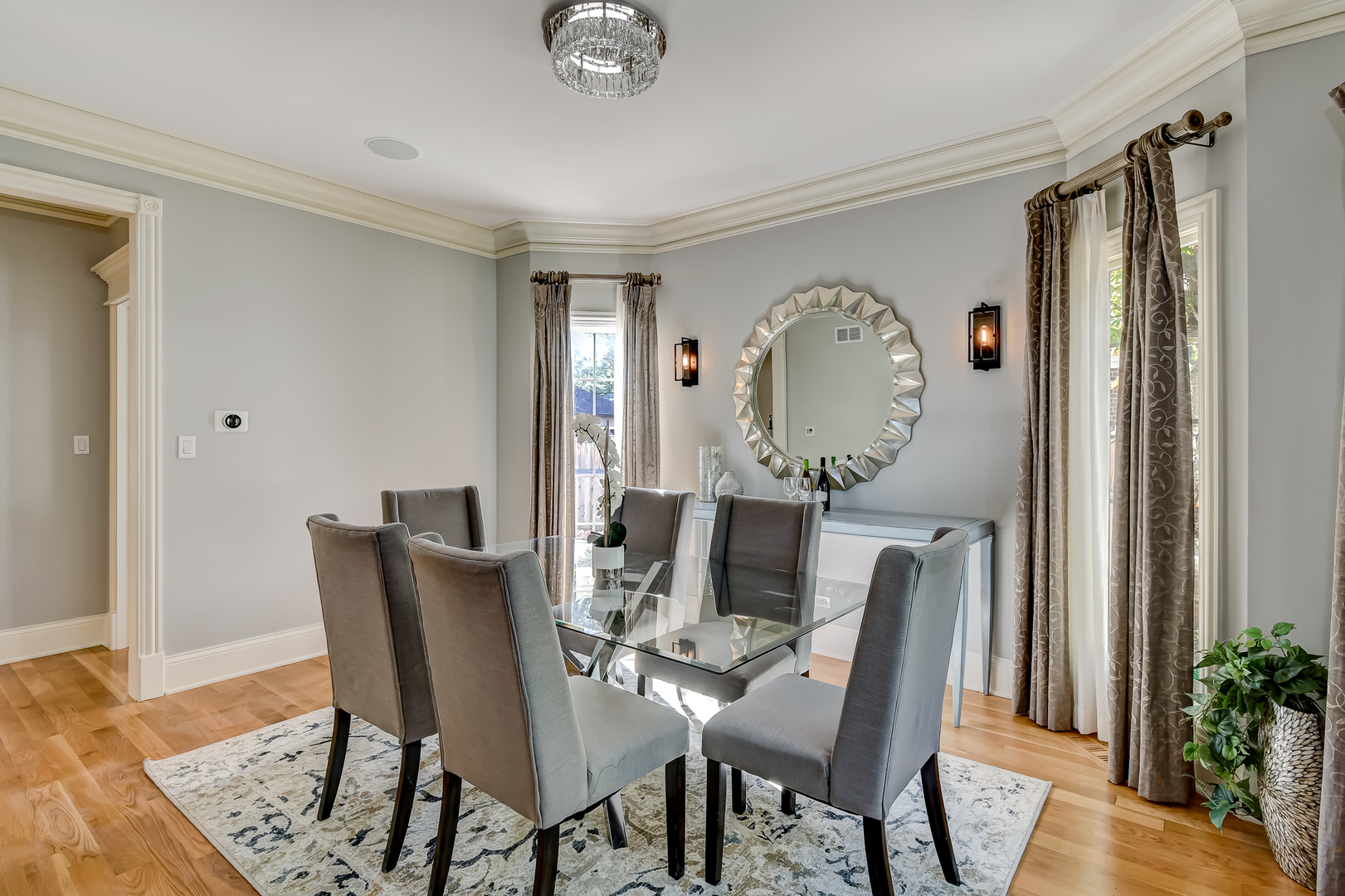 621 North County Line Road Hinsdale, IL 60521 - Photo 6 of 48 a view of a dining room with furniture and wooden floor