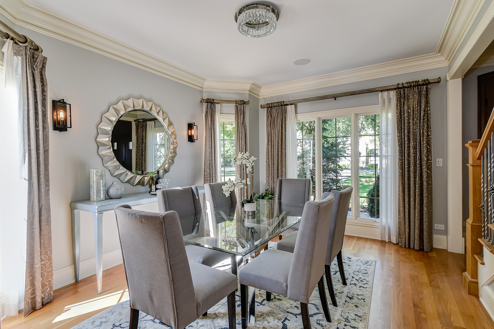 621 North County Line Road Hinsdale, IL 60521 - Photo 7 of 48 a view of a dining room with furniture and a large window