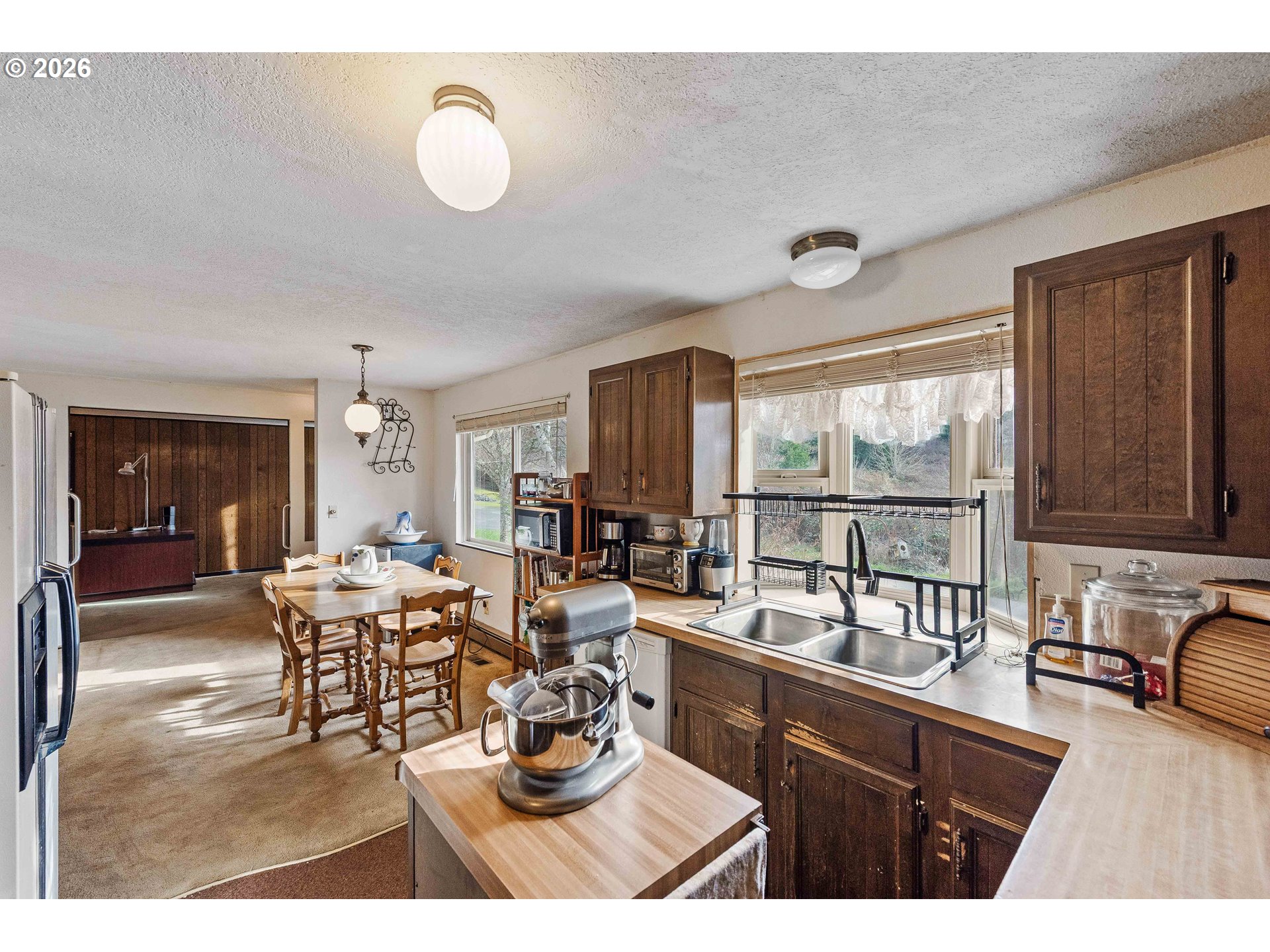 2031 Kincheloe Lane Myrtle Point, OR 97458 - Photo 12 of 33 a view of a dining room with furniture window and outside view