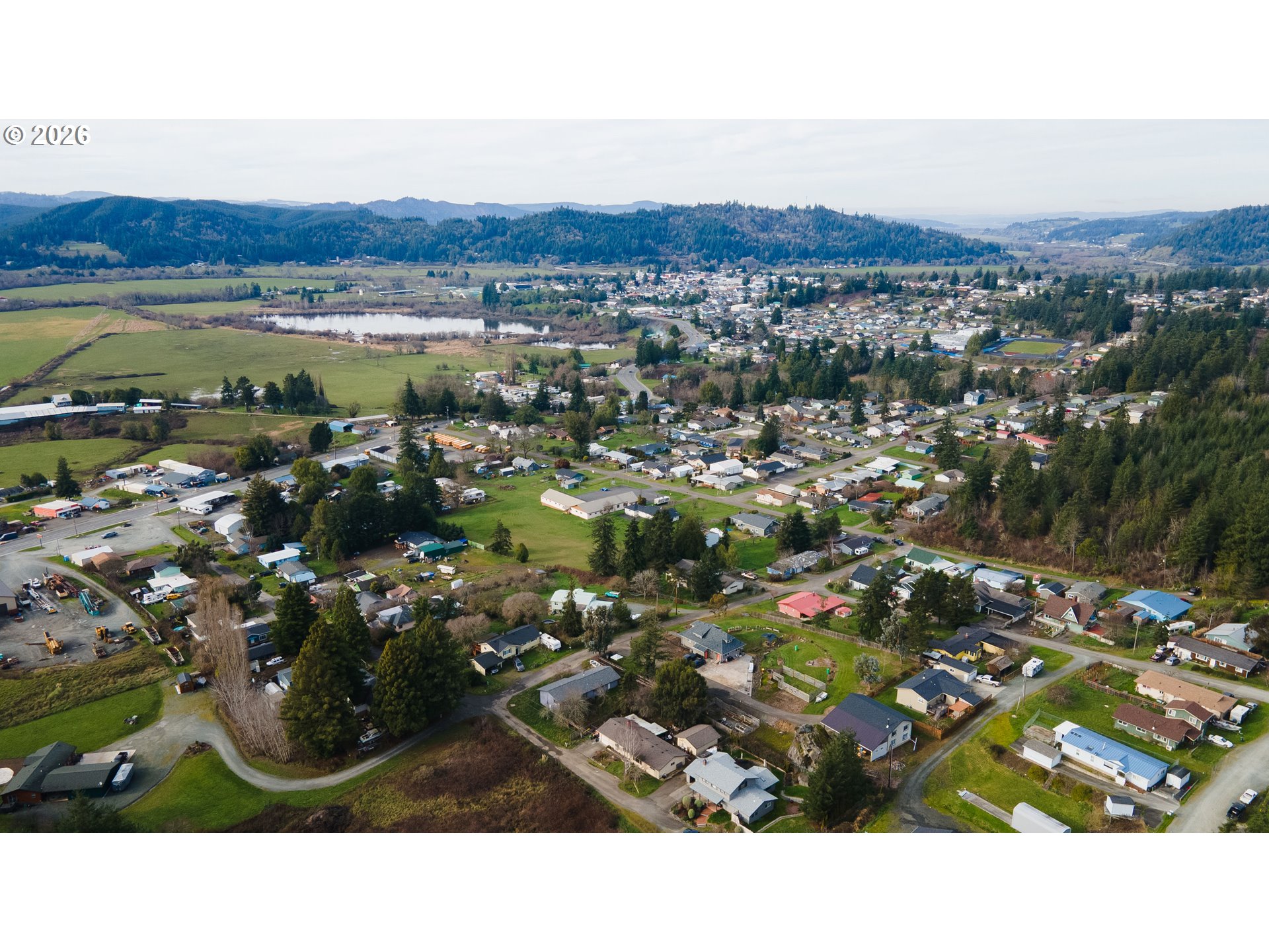 2031 Kincheloe Lane Myrtle Point, OR 97458 - Photo 7 of 33 a black and white photo of a city