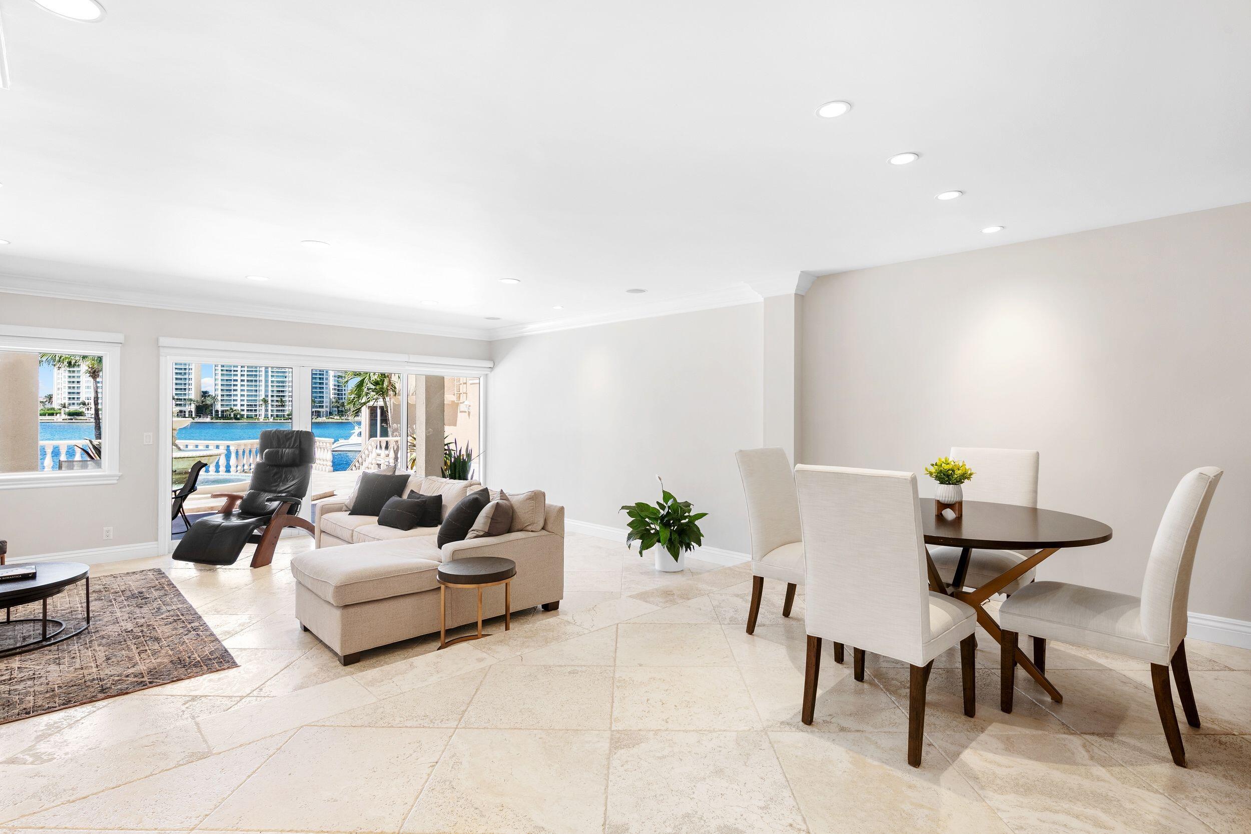 555 South Ocean Boulevard, Unit 4 Boca Raton, FL 33432 - Photo 15 of 39 a living room with furniture and a potted plant