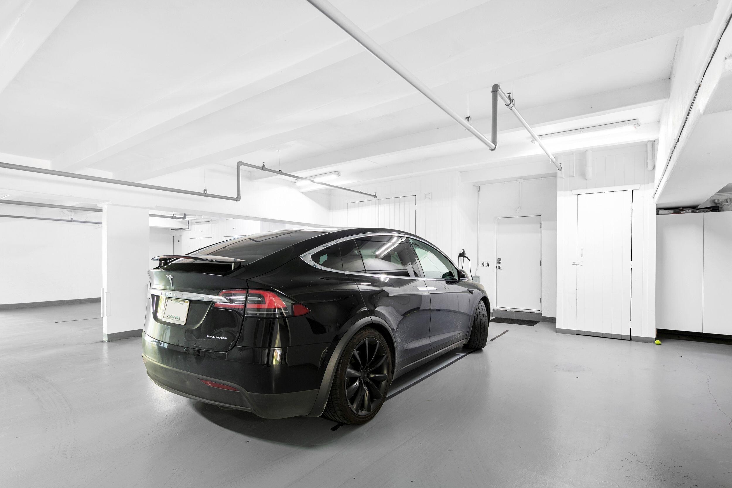 555 South Ocean Boulevard, Unit 4 Boca Raton, FL 33432 - Photo 37 of 39 a car parked in garage