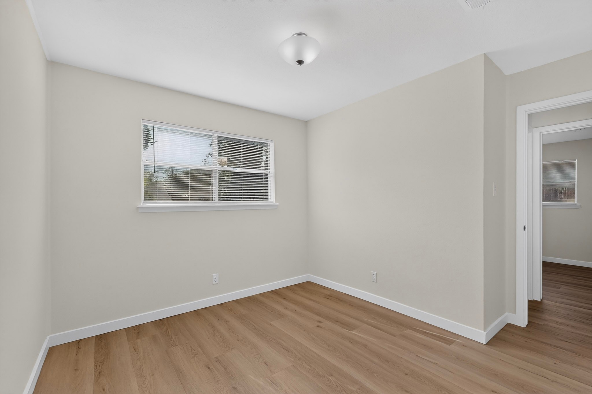 6507 Middleham Place Austin, TX 78745 - Photo 15 of 20 one of two secondary bedrooms at back of home