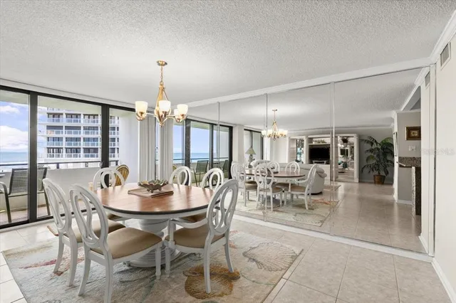 a dining room with furniture window and outdoor view