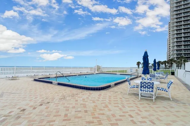 a picture of a bathroom with a shower