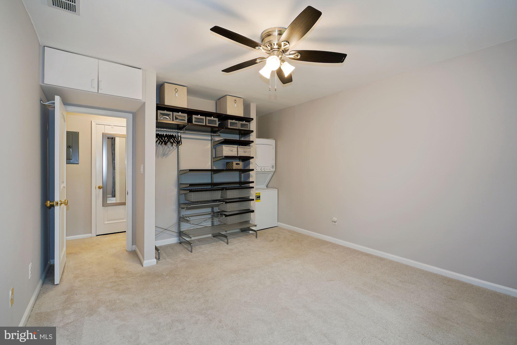5907 G Kingsford Road, Unit 400 Springfield, VA 22152 - Photo 16 of 20 wooden floor in an empty room