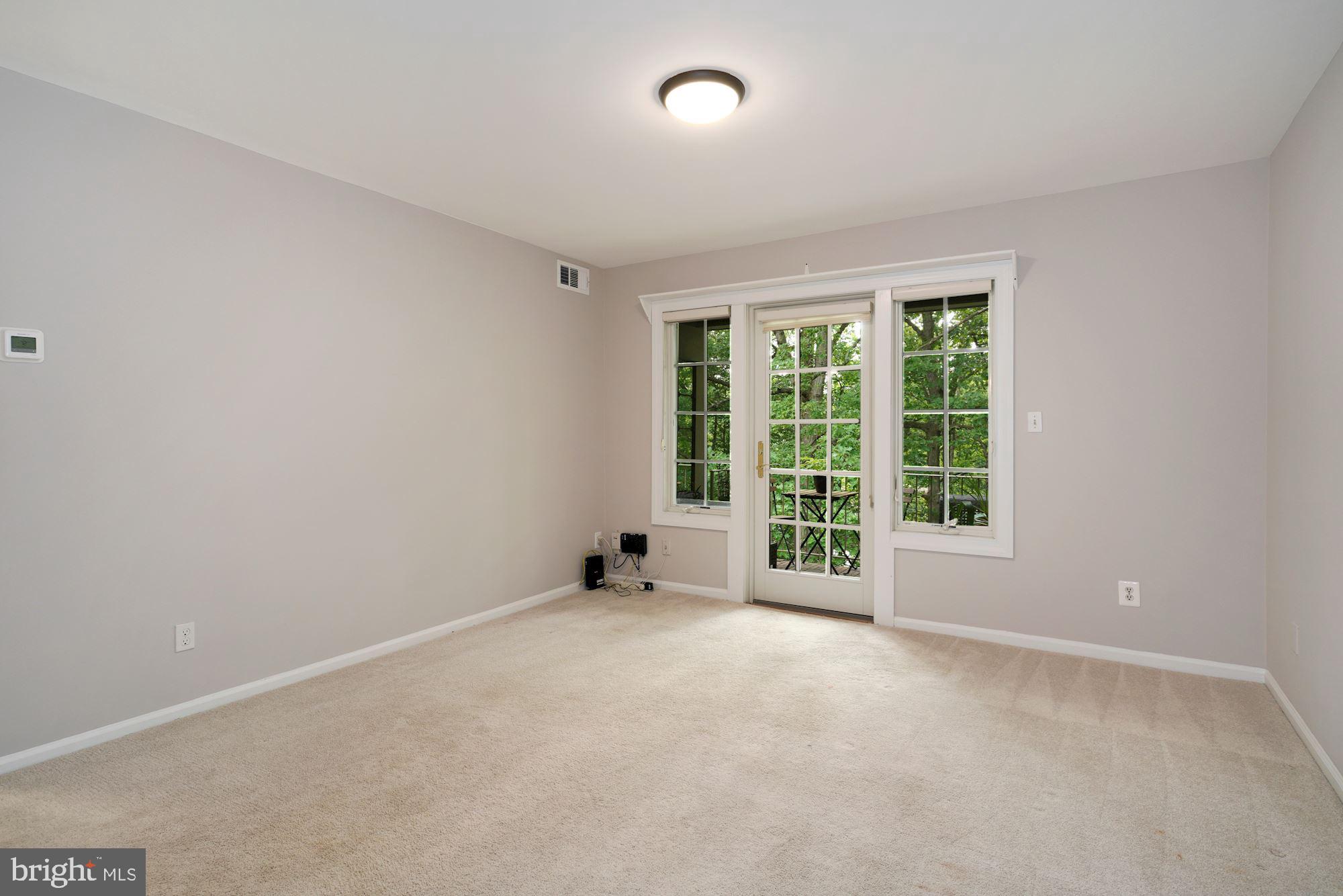 5907 G Kingsford Road, Unit 400 Springfield, VA 22152 - Photo 7 of 20 an empty room with a window